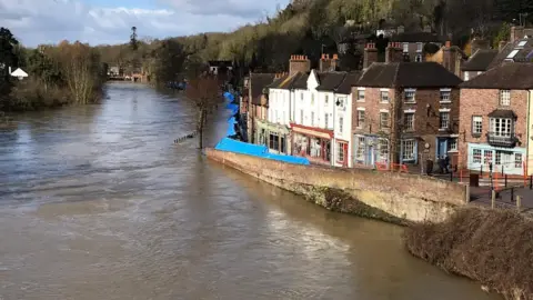 Defences along The Wharfage in Ironbridge buckled