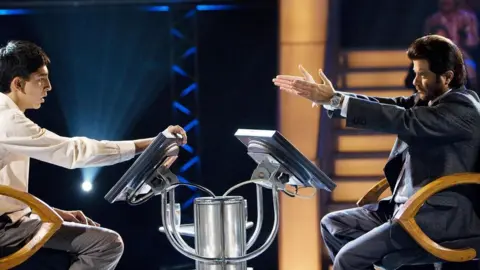 Warner Bros Dev Patel and Anil Kapoor star in 2008's Slumdog Millionaire