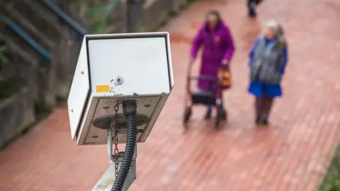 Getty Images A security camera watching a street