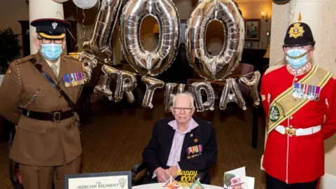 PA Media Major Peter Lewis and Corporal Phillip Thornton with Bob King