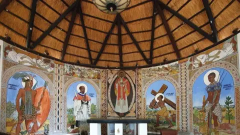 The Curtain Foundation Murals above the altar at the Cyrene Mission Chapel, 2022