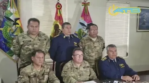 AFP Grab taken from a handout video released by ATB showing the commander in chief of the Armed Forces, Williams Kaliman (C-bottom), speaking in a televised address from La Paz, on November 10, 2019.
