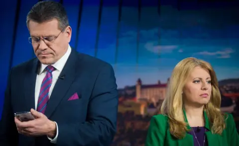 EPA The two rivals took part in a TV debate immediately after the first round on 17 March