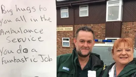West Midlands Ambulance Service Paramedics Alison and Gary with the note