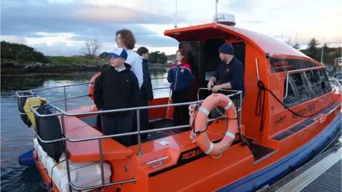 BBC Children taking a boat to school