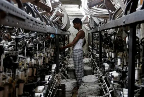 Reuters An employee works inside a garment factory in Mumbai, India February 28, 2017