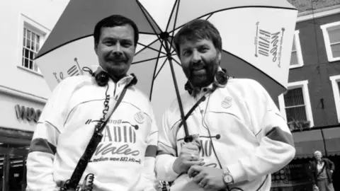 Frank Hennessy and Roy Noble at a roadshow in the 1980s