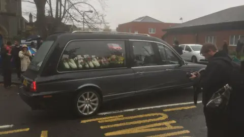 The funeral car on the way to the church