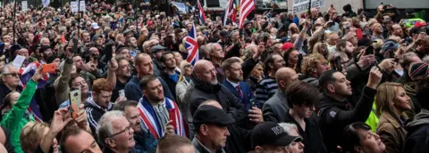 Getty Images Crowds outside Tommy Robinson court case