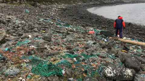 Kik-Plastic Rubbish on a beach near Scourie, Sutherland