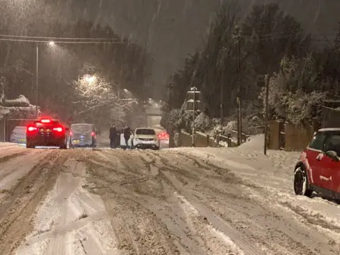 Schools shut and cars abandoned in Suffolk due to snow