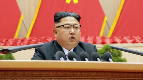 Getty Images North Korean leader Kim Jong-Un (C) delivering a speech at the First Conference of Chairpersons of the Primary Committees of the Workers' Party of Korea (WPK)