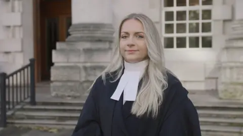 Ben Robinson/Brown O'Connor Communications Shows criminal barrister Taryn Graham outside a courthouse