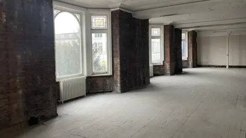 Andrew Turner/BBC The stripped out interior at the old Palmers building