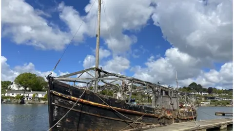 Broken wooden fishing boat