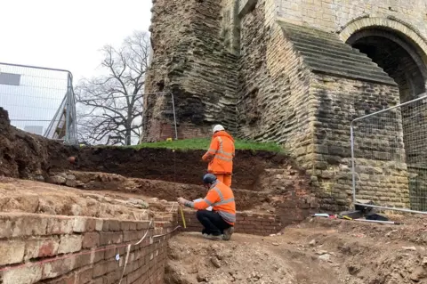 BBC Dig outside gatehouse