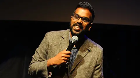 Getty Images Romesh Ranganathan is a TV comedy star and stand-up