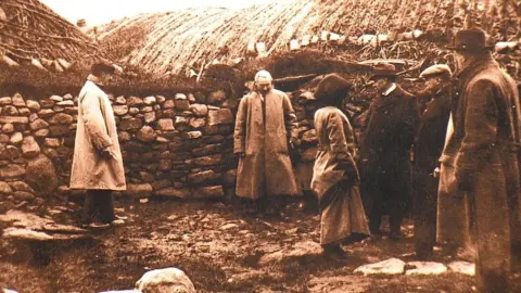 Highland Folk Museum/High Life Highland Dewar Committee at a "black house"