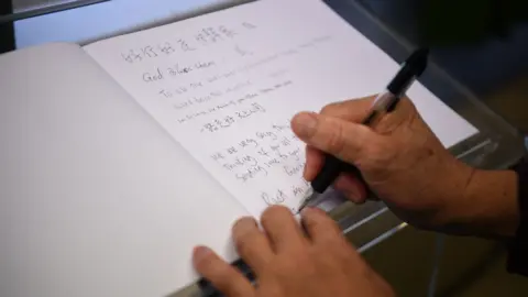 Kirsty O'Connor / PA Wire Memorial for migrants killed in Essex lorry container