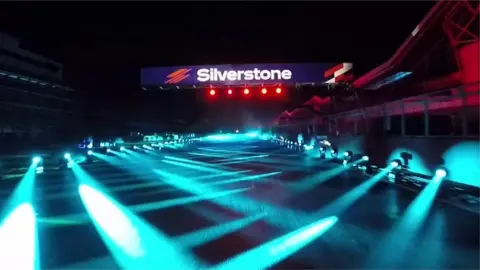 Silverstone sign over illuminated race track