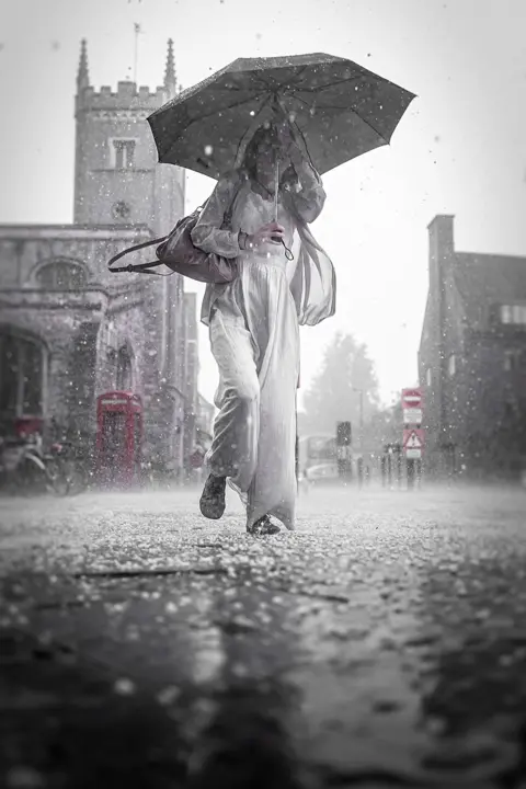 Martin Bond Woman with an umbrella in Cambridge