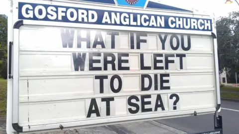ROD BOWER Gosford Anglican Church billboard reads: "What if you were left to die at sea"