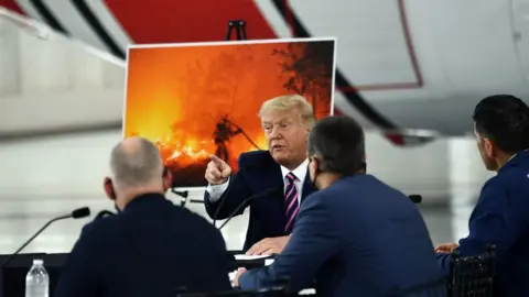 Getty Images US President Trump speaks during a briefing on wildfires with local and federal fire and emergency officials in Sacramento