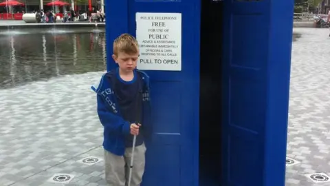 Living Paintings Louis Moorhouse as a child with a police phone box