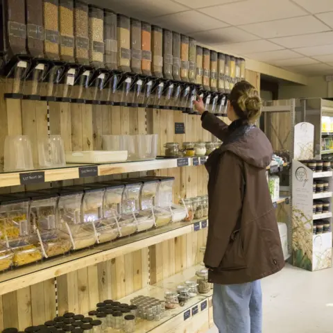 Alice Zoo Lily Woodhams at the dry goods store