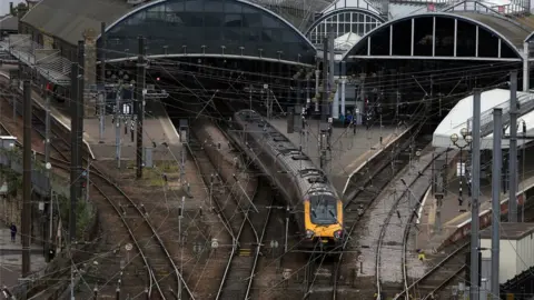 BBC A train leaving Newcastle Central Station