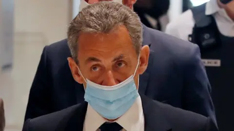 Reuters Nicolas Sarkozy in court in Paris, 1 March 2021