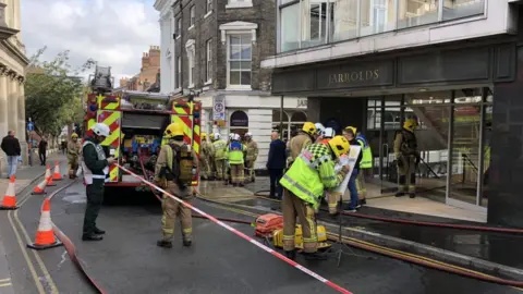 BBC Fire fighters outside Jarrold in Norwich