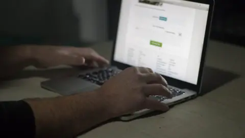 Getty Images File image of a person using a laptop