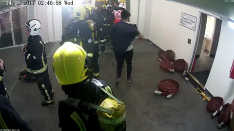 Grenfell Tower Inquiry Omar Alhaj Ali leaves the building - image from CCTV