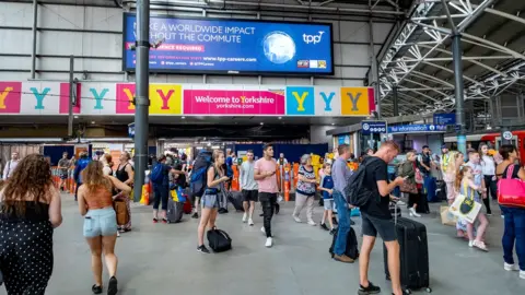 Network Rail Leeds railway station busy with passengers