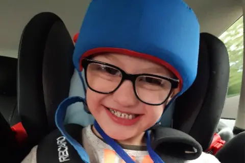 Rachael James in his padded helmet