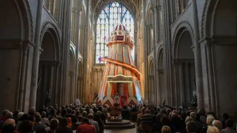 Getty Images Congregation in front of helter-skelter