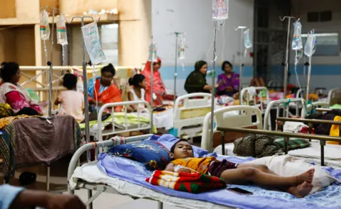 Reuters A dengue infected child lies on a bed after getting hospitalised for treatment at Mugda Medical College and Hospital, as the yearly death toll from the disease has surpassed the previous record in the country, in Dhaka, Bangladesh, September 5, 2023.