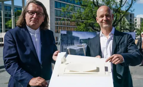 EPA Johannes Milla (L) and Sebastian Letz of Milla & Partners, 28 May 20