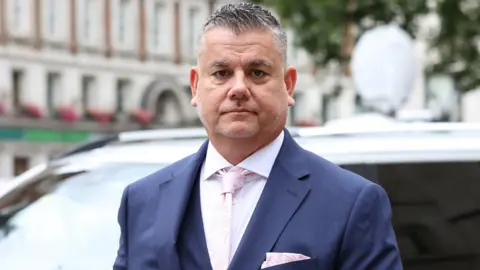 PA Media Sean Bett Johnny Depp"s former head of security, arrives at the High Court in London to give evidence in the actor"s libel case against the publishers of The Sun and its executive editor, Dan Wootton. PA Photo. Picture date: Thursday July 16, 2020. 57-year-old Depp is suing the tabloid"s publisher News Group Newspapers (NGN) over an article which called him a "wife beater" and referred to "overwhelming evidence" he attacked Ms Heard, 34, during their relationship, which he strenuously denies