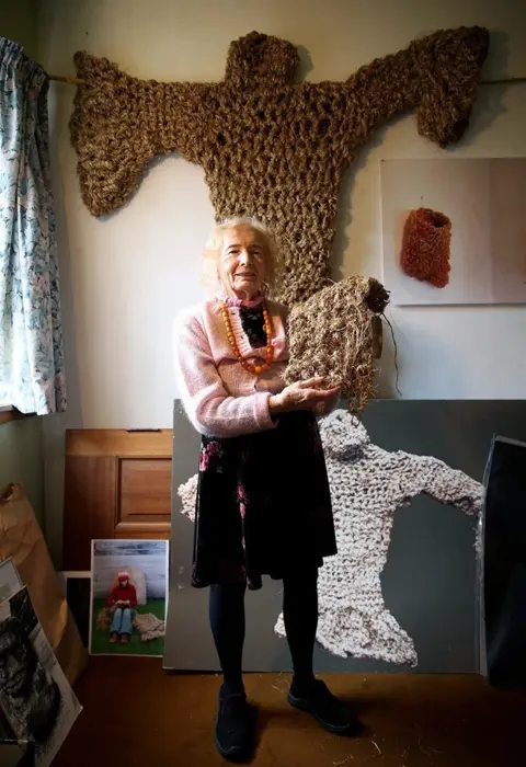 Graeme Roger Joyce with some of the Art Extraordinary pieces