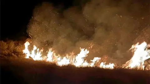 Firefighter Olly Jones Fire burning through the gorse
