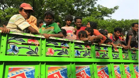 BBC A group of Rohingya men and young boys