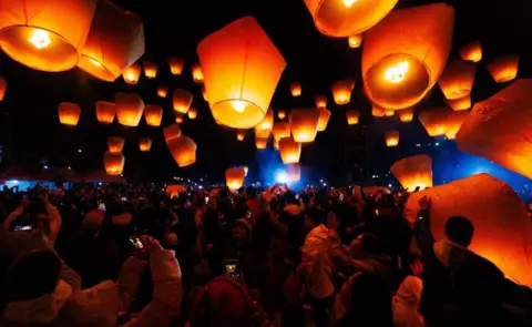 RITCHIE B TONGO/EPA-EFE/REX/Shutterstock People release sky lanterns during the celebration of Sky Lantern Festival, in Pingxi, New Taipei City, Taiwan