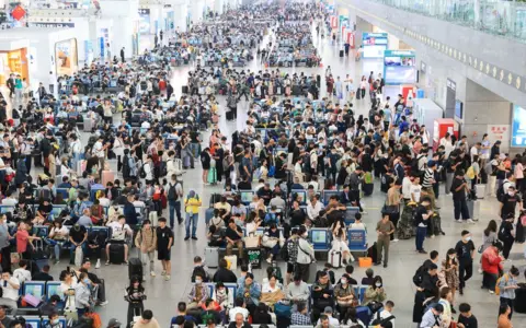 Getty Images Passengers travel at Nanjing South Railway Station in Nanjing, East China's Jiangsu province, Sept 28, 2023.