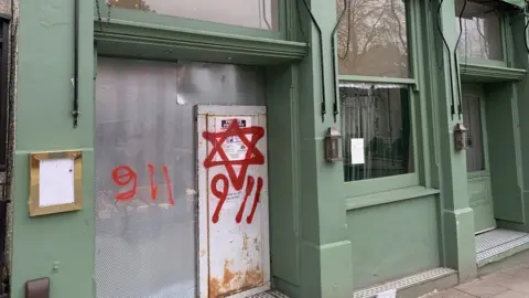 James Sorene Graffiti on Hampstead shop front