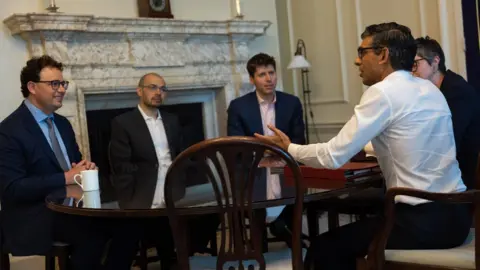 No10 Downing Street Anthropic CEO Dario Amodei, DeepMind founder Demis Hassabis and Sam Altman meet Prime Minister Rishi Sunak at Number 10