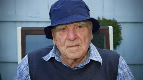 Martin Giles/BBC Neville Copeman