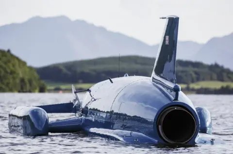 Getty Images Bluebird, photographed from behind, on Loch Fad, August 2018