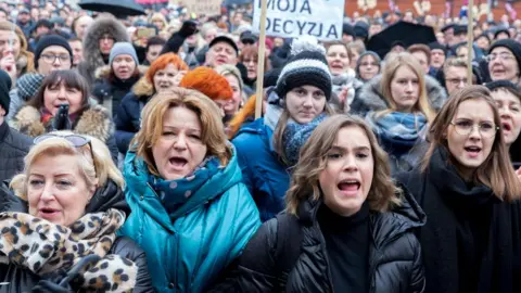 EPA People take part in the nationwide women's strike "Black Friday" to protest against the tightening of the abortion law in Katowice